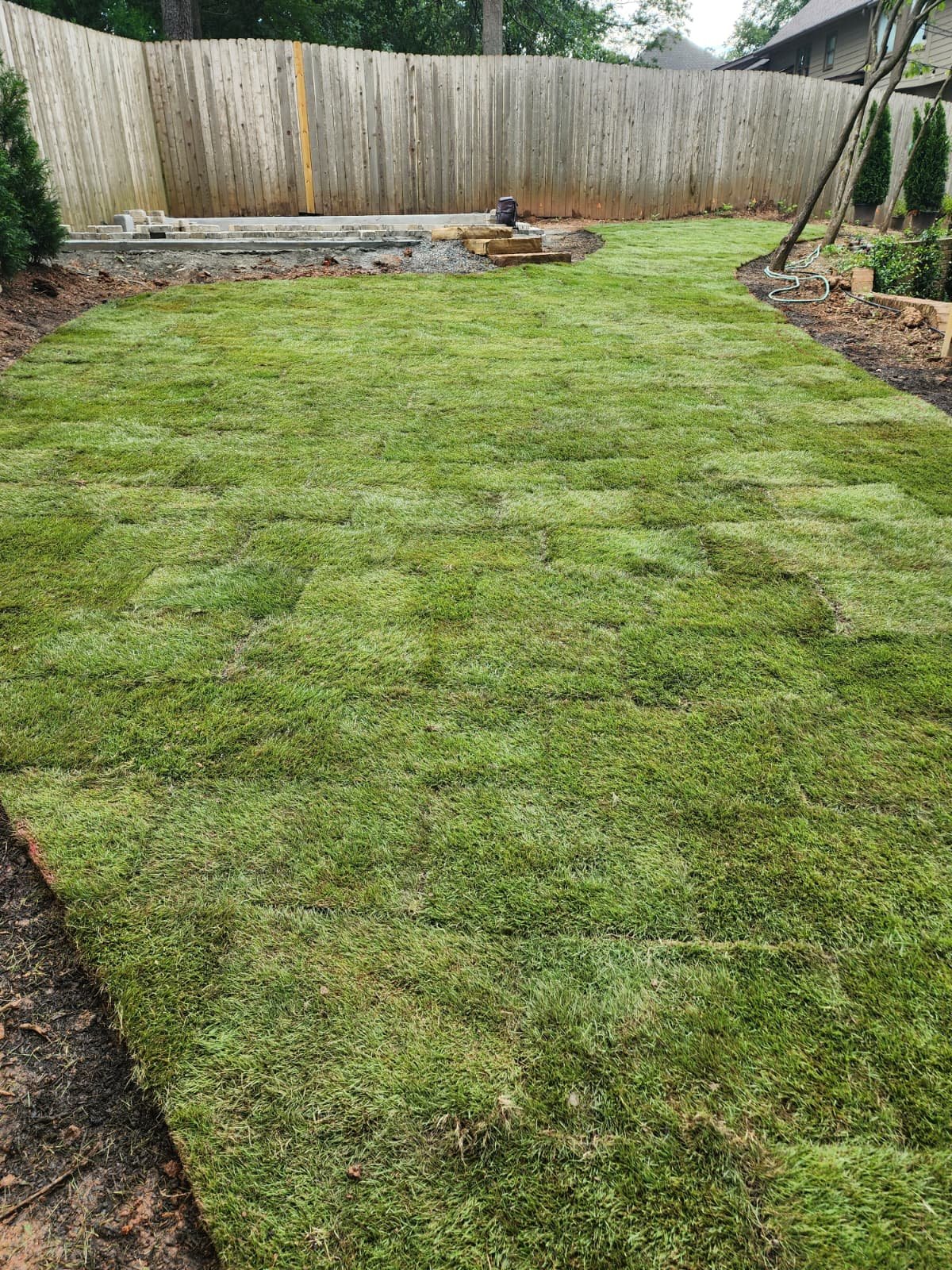 Sod and artificial turf work, view 3